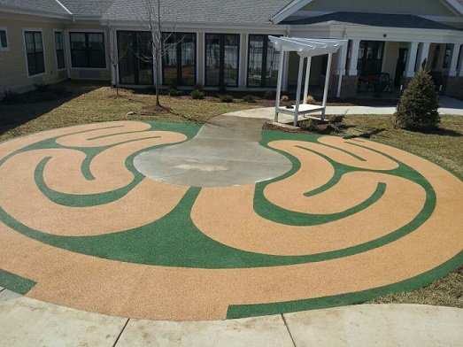 Ecoturf Surfacing Taylormade gallery Kansas City Missouri Weeks Elementary poured in place surfacing graphics and designs omaha nebraska des moines iowa oklahoma city kansas city missouri st. louis chicago illinois synthetic turf bonded rubber mulch colorful fall safety cushion rubber colorful fun children playground