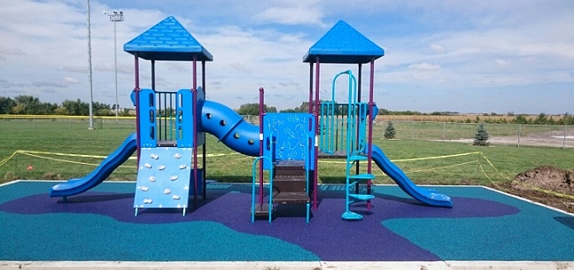 Ecoturf Surfacing Taylormade gallery stromsburg nebraska memorial park lindsays park poured in place surfacing graphics and designs teal purple omaha nebraska des moines iowa oklahoma city kansas city missouri st. louis chicago illinois synthetic turf bonded rubber mulch colorful fall safety cushion rubber colorful fun children playground